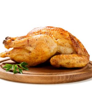 Whole roasted chicken isolated on white background